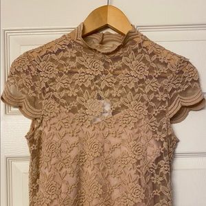 Brand new with tag. Beige colour blouse.